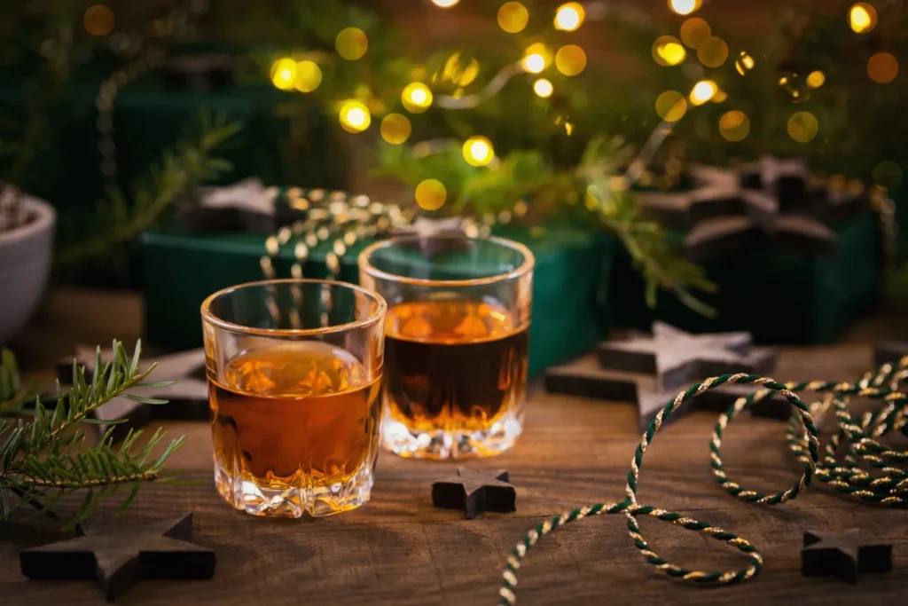 whiskey glass on christmas-decorations-table