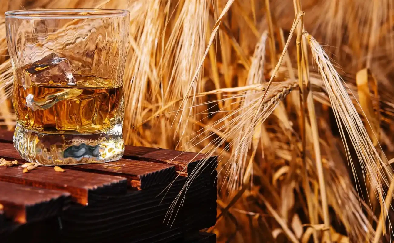 glass-whiskey-in field glass-whiskey-in field
