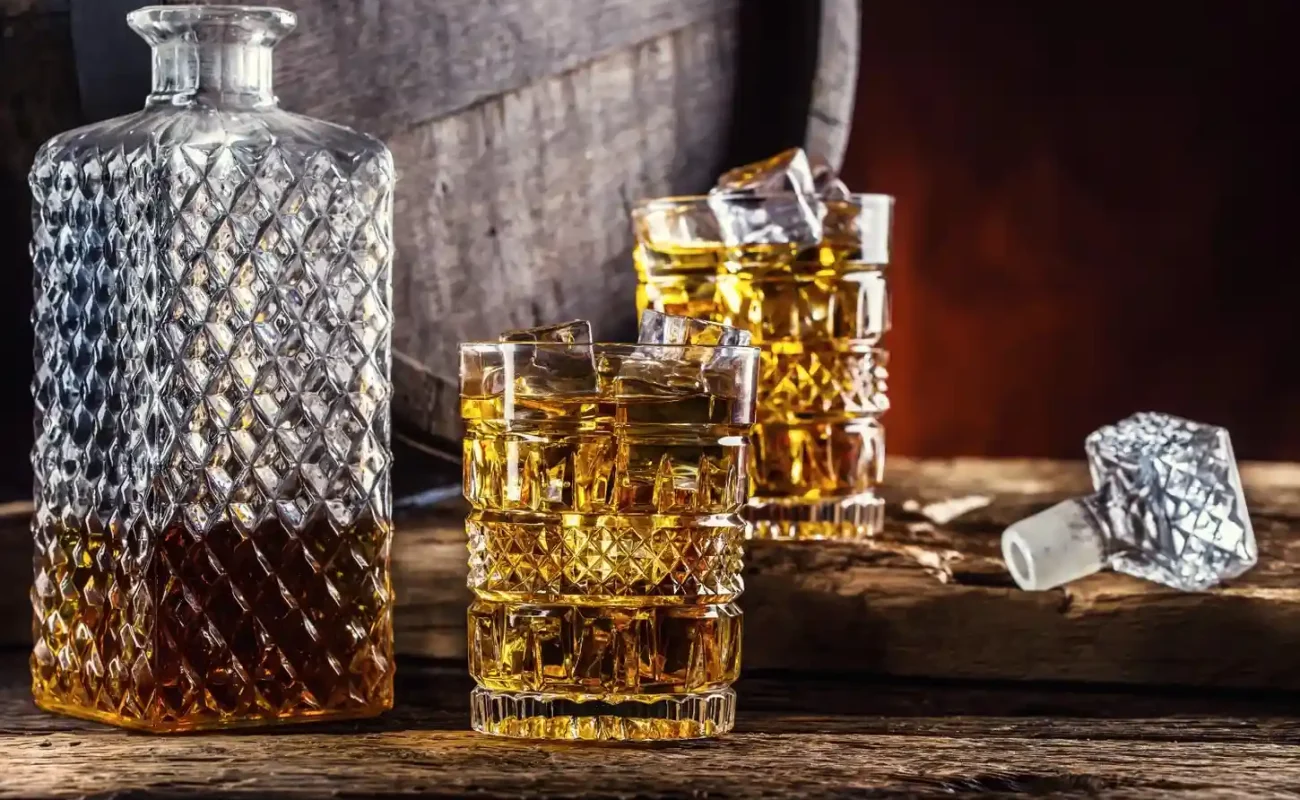 two-cups-full-beverage-whiskey-with-ice-cubes-retro-style two-cups-full-beverage-whiskey-with-ice-cubes-retro-style