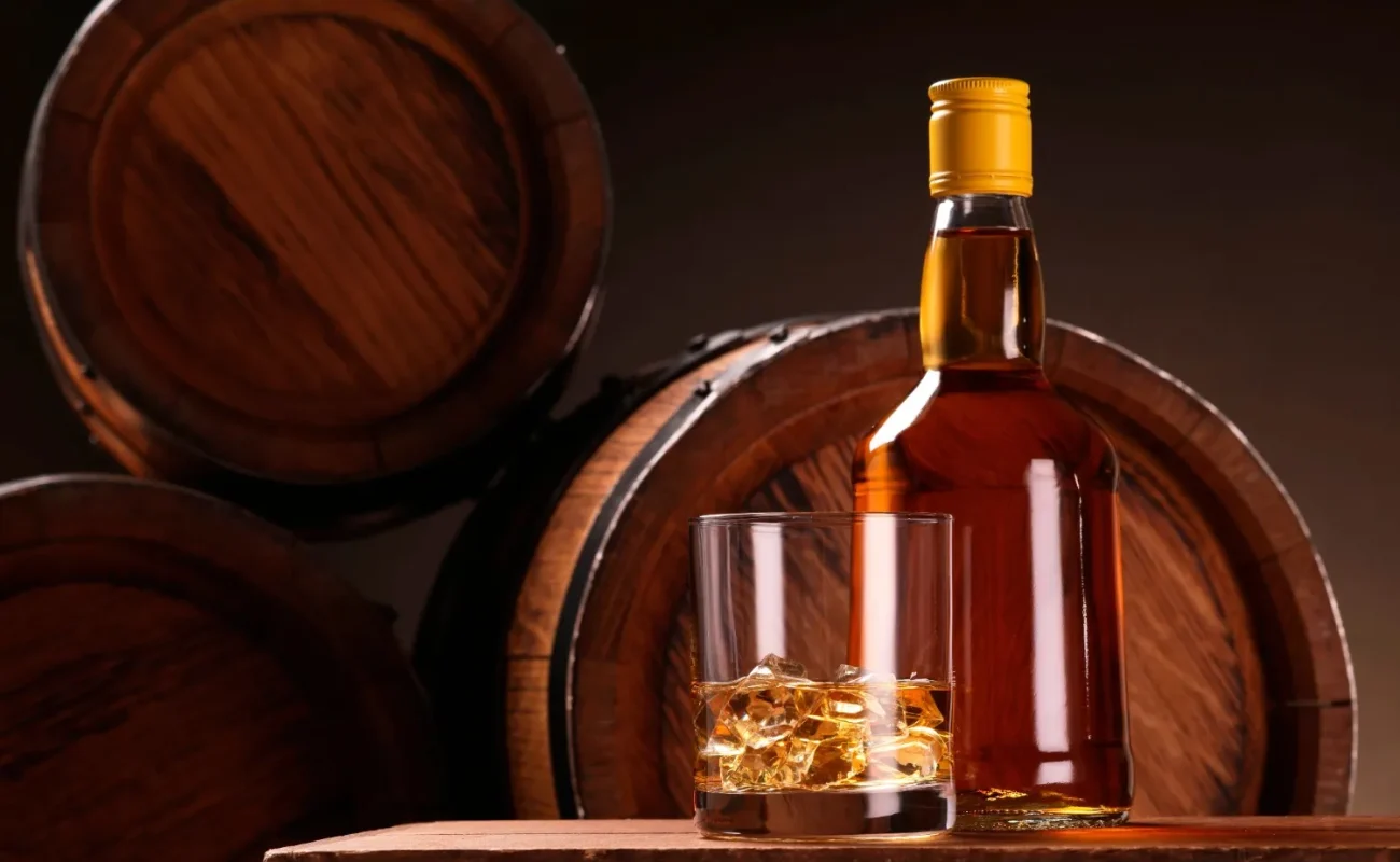 whiskey bottle with wooden cask barrel