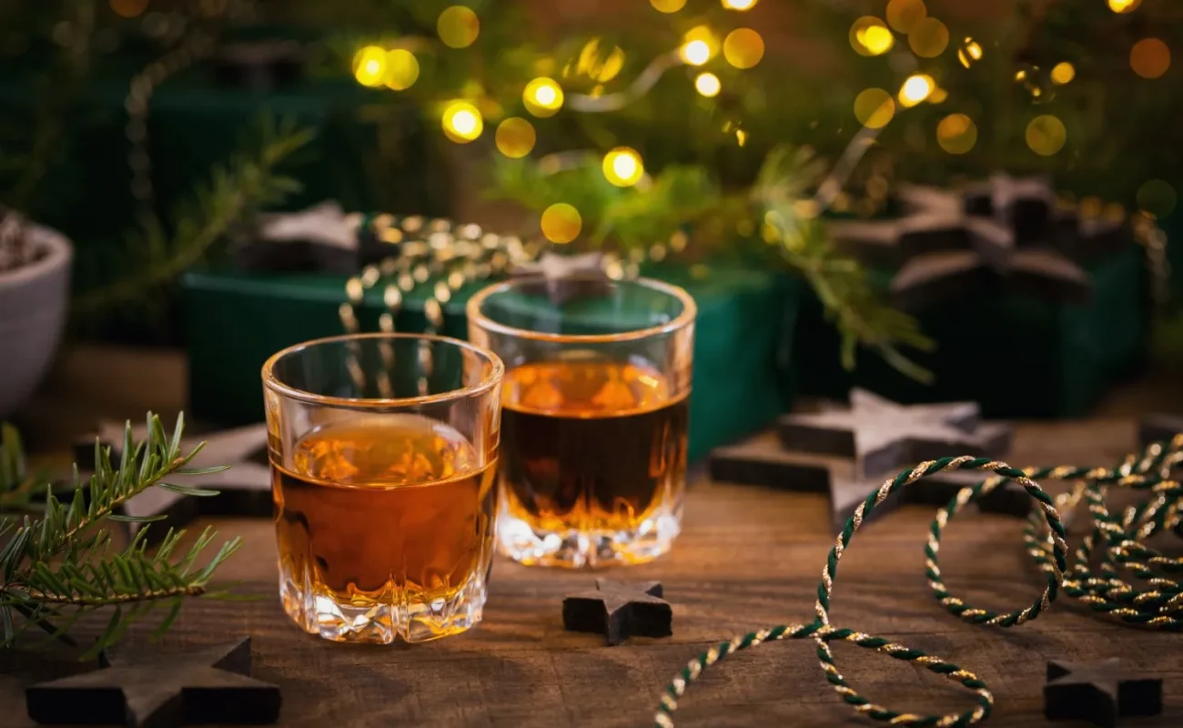 whiskey glass on christmas-decorations-table
